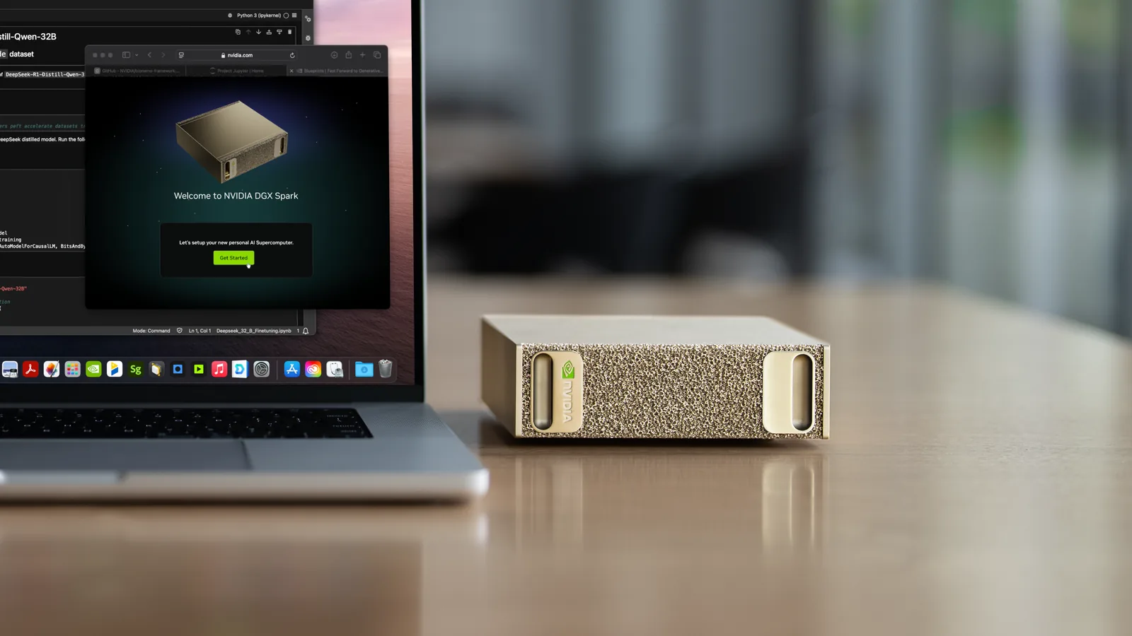 An NVIDIA DGX Spark on an office desk beside a laptop